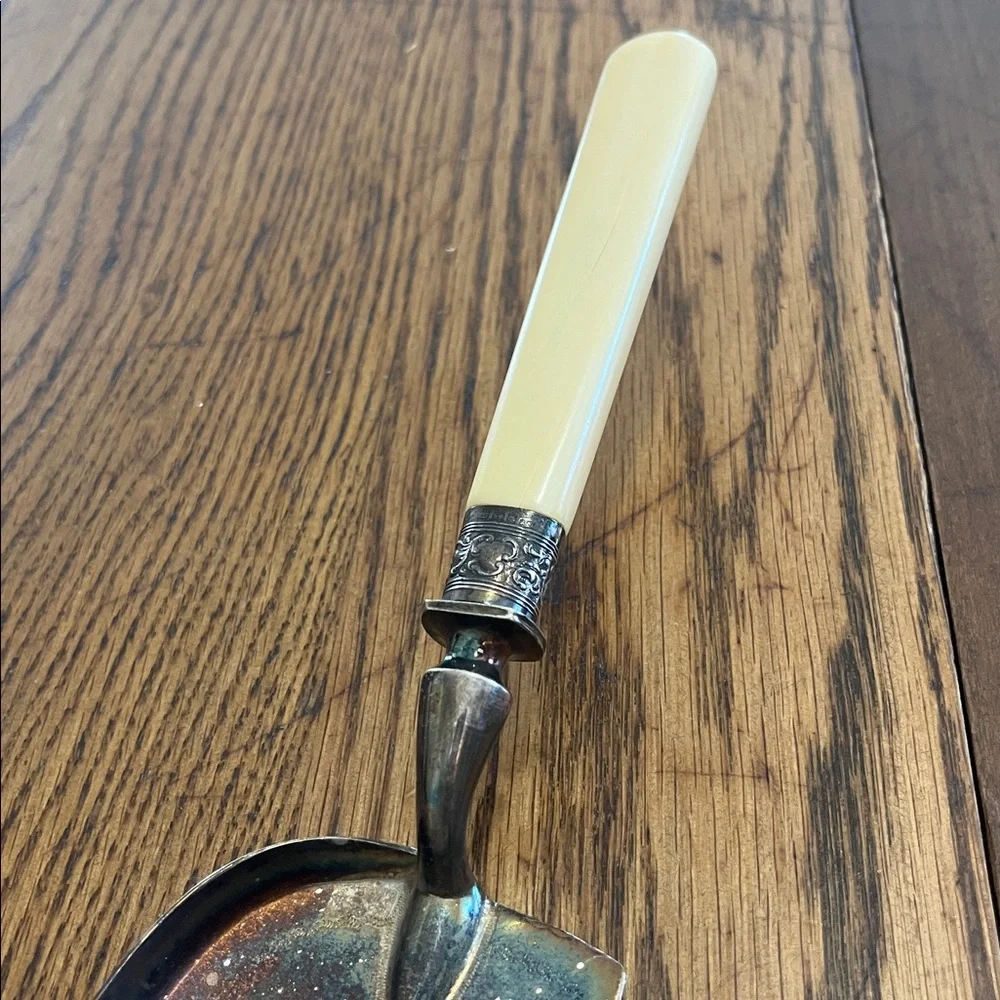 Vintage Silver and Cream crumb scraper